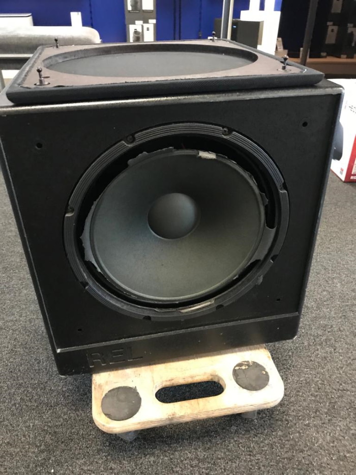 REL Q100E subwoofer with a damaged foam surround